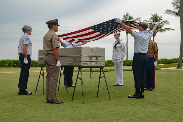 Members of the Defense POW/MIA Accounting Agency (DPAA) repatriation team prepare to drape a flag during a repatriation ceremony in the Socialist Republic of Vietnam, Sept. 10, 2024. The ceremony marked the end of the joint field activity and this iteration’s efforts to recover unaccounted-for personnel from the Vietnam War. During the ceremony, team members and Socialist Republic of Vietnam officials transferred possible osseous material to DPAA for potential identification at the DPAA laboratory on Joint Base Pearl Harbor-Hickam, Hawaii. There are approximately 1,576 personnel missing from the Vietnam War. (U.S. Army photo by Staff Sgt. Keion Jackson)