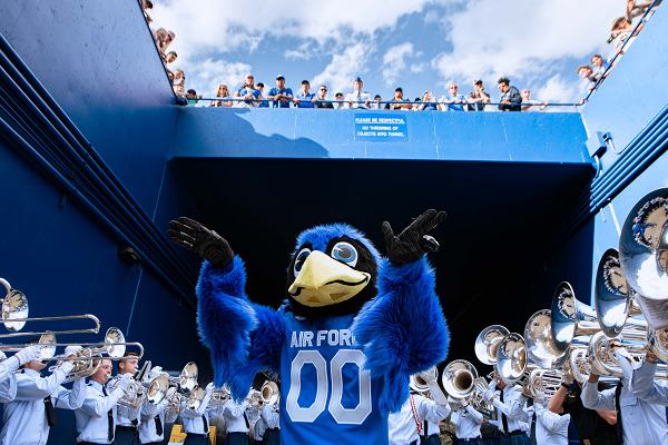 The Air Force costumed mascot, “The Bird,” and Academy band perform in the tunnel prior to a football game against San Jose State University in Falcon Stadium at the U.S. Air Force Academy in Colorado Springs, Colo., Sept. 7, 2024. The Air Force fell to SJSU 17-7 in their second regular season matchup. (U.S. Air Force photo by Dylan Smith) 