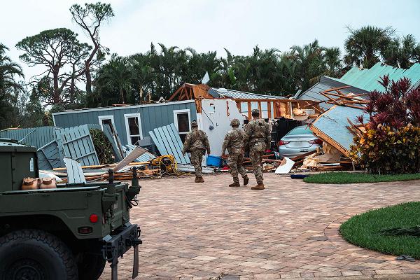 U.S. soldiers from the Florida and South Carolina National Guard search for residents in need of assistance near Stuart, Florida, Oct. 10, 2024. Areas of the city were decimated by tornadoes spawned by Hurricane Milton as the storm progressed across the state. The soldiers are assigned to Charlie Company 1st Battalion, 124th Infantry Regiment, 53rd Infantry Brigade Combat Team, and Detachment 1, 1051st Transportation Company, 1050 Transportation Battalion, in Florida and South Carolina, respectively. Currently, there are over 6,500 soldiers and airmen from Guard units in Florida, South Carolina, Virginia, Michigan, Arkansas, New York, and Louisiana assisting state and local officials in response operations across impacted areas of Florida. (U.S. Air National Guard photo by Maj. Cammy Alberts/photo edited for privacy protection)