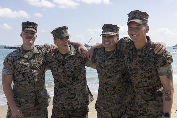 From left, U.S. Marine Corps Lance Cpl. Stephen Estrada, Lance Cpl. Samuel Calhoun, U.S. Navy Petty Officer 3rd Class Jett Garcia, and Cpl. Austin Potter responded and rendered first aid to a Japanese resident following a car crash on the Okinawa Expressway, Okinawa, Japan on Oct. 6, 2024. They are forward deployed in the Indo-Pacific with 4th Marine Regiment, 3d Marine Division as part of the Unit Deployment Program. (U.S. Marine Corps photo by Lance Cpl. Nevaeh Segura) 
