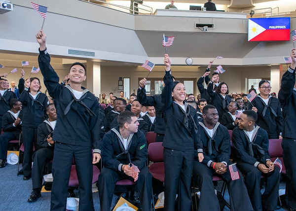Recruits take the Oath of Allegiance to the United States of America during a naturalization ceremony in the Recruit Memorial Chapel at Recruit Training Command. More than 40,000 recruits train annually at the Navy's only boot camp. (U.S. Navy photo by Mass Communication Specialist 1st Class John Suits)                                                                                  