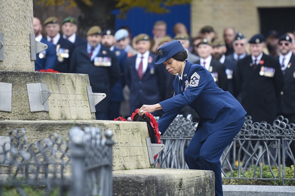 U.S. Air Force Chief Master Sgt. Tiffany Griego, 100th Air Refueling Wing command chief, lays a wreath at a war memorial on Angel Hill during a Remembrance Day ceremony in Bury St. Edmunds, United Kingdom, Nov. 10, 2024. By participating in Remembrance Day, U.S. service members honored the sacrifices made by their British counterparts, showing the U.S.' dedication to its allies not only in times of war but also in moments of peace. (U.S. Air Force photo by Tech. Sgt. Timothy Moore) 