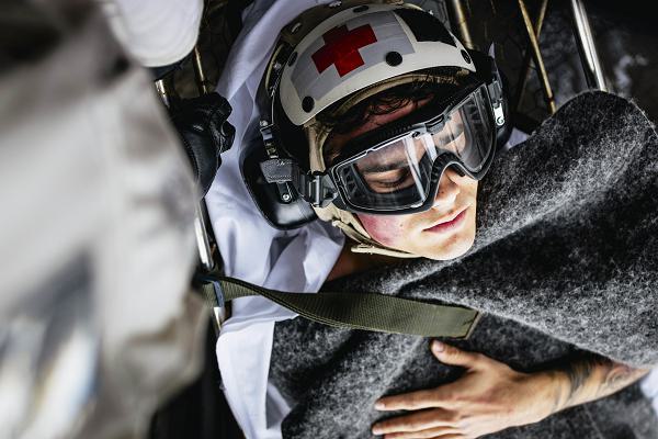 Sailors carry Intelligence Specialist 2nd Class Isaac Eaker, from La Jolla, California, assigned to intelligence department’s satellite imagery analyzation division, to an elevator on the flight deck during a medical drill aboard Nimitz-class aircraft carrier USS George Washington (CVN 73) while underway in the Pacific Ocean, Nov. 11, 2024. George Washington is 7th Fleet’s premier forward-deployed aircraft carrier, a long-standing symbol of the United States’ commitment to maintaining a free and open Indo-Pacific region, while operating alongside Allies and partners across the U.S. Navy’s largest numbered fleet. (U.S. Navy photo by Mass Communication Specialist 3rd Class August Clawson)