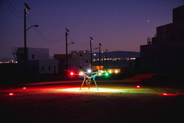A team of Department of Defense drone operators and experts test the technical capabilities of various Uncrewed Aerial Systems (UAS) during a Defense Innovation Unit led prize challenge to identify platforms, components, and capabilities for Blue UAS, which clears and validates flying platforms are safe to fly, cyber-secure, and meet DOD requirements, at Marine Corps Air Ground Combat Center, Twentynine Palms, California, on Nov. 2-6, 2024. The Blue UAS Refresh Challenge included more than 35 platforms and companies, and an expert team of 40 military drone end-users with participation from each service branch and several major program offices in support of the Department’s ability to quickly scale and field commercially produced drone technologies for military and government use. (DOD photo by Devon Bistarkey, Defense Innovation Unit)