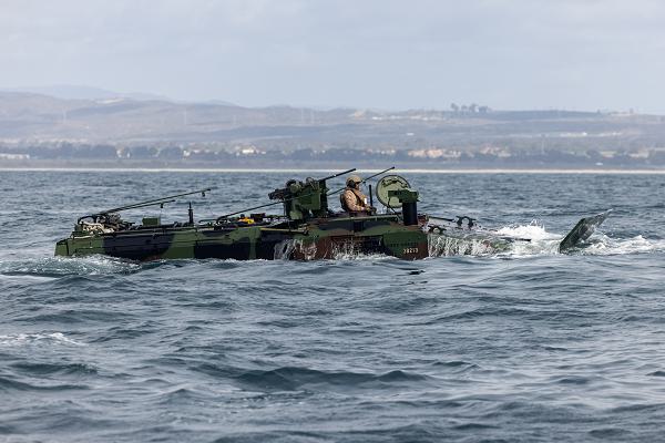 A U.S. Marine with 3rd Assault Amphibian Battalion, 1st Marine Division, operates an Amphibious Combat Vehicle transporting Marines with 1st Battalion, 7th Marine Regiment, 1st MARDIV, as part of Quarterly Underway Amphibious Readiness Training off the coast of Marine Corps Base Camp Pendleton, California, Oct. 28, 2024. QUART is a joint training exercise designed to develop and sustain essential amphibious skills for effective operations in maritime environments while reinforcing the Navy-Marine Corps partnership. As part of QUART, Marines with 3rd AA Bn. were certified to conduct ship-to-shore operations. (U.S. Marine Corps photo by Cpl. Kyle Chan)