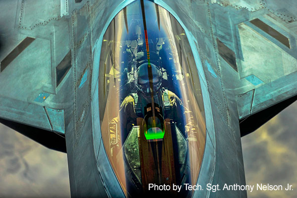 Syria, March 2, 2018 - An Air Force F-22 prepares to receive fuel from a KC-10 Extender over Syria. The F-22 is assigned to the 380th Air Expeditionary Wing, Al Dhafra Air Base, United Arab Emirates. The aircraft possesses a sophisticated sensor suite allowing the pilot to track, identify, shoot and kill air-to-air threats before being detected. 