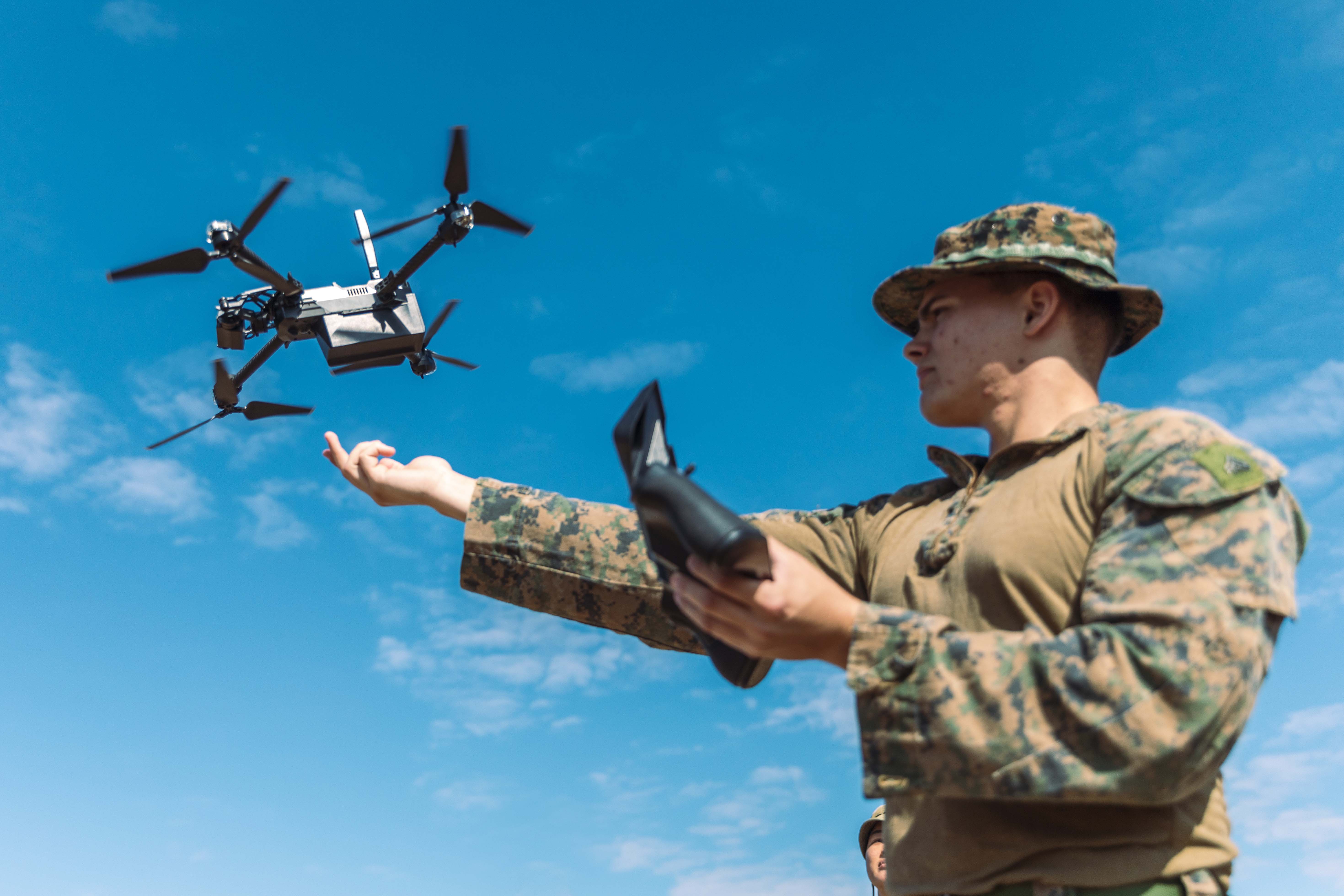 U.S. Marine Corps Cpl. Brian Vile, an intelligence specialist with Marine Rotational Force – Darwin 24.3, operates a Skydio drone as part of a counter-unmanned aircraft systems field test at Mount Bundey Training Area, NT, Australia, July 11, 2024. The Marines and Australian Soldiers with the Robotics and Autonomous Implementation and Coordination Office, Australian Army Headquarters, used C-UAS to enhance MRF-D 24.3 Marine Air-Ground Task Force capabilities to defend against aerial attacks. Vile is a native of Pennsylvania. (U.S. Marine Corps photo by Cpl. Migel A. Reynosa)