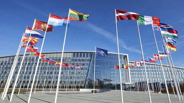 NATO DEFENSE MINISTERS URGE CHANGES TO ALLIANCE COLLECTIVE DEFENSE
