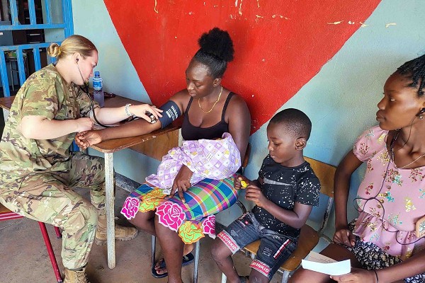 A South Dakota Army National Guard Medic tests the blood pressure of a villager in the South American country of Suriname. Some thirty soldiers from the South Dakota National Guard travelled to this South American country to provide medical and dental services as part of America’s international partnerships for mutual aid. (U.S. Army photo courtesy of the North Dakota National Guard).