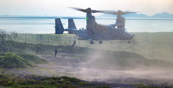 Kunsan Air Base, South Korea. (September 2, 2022):  In this photo by Air Force Staff Sergeant Steven Adkins, Special Tactics Airmen fast rope down from a CV-22 Osprey tilt-rotor aircraft during joint training with the South Korean Air Force. Based at Kadena Air Base, Japan, these highly trained war fighters routinely deploy to assist their Republic of Korea comrades to confront North Korean aggression.