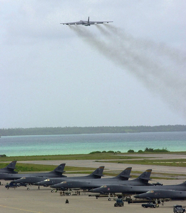 Diego Garcia, Indian Ocean. (Oct. 22, 2001): In this photo by Staff Sergeant Shane Cuomo, an Air Force B-52 bomber from the 28th Expeditionary Wing takes off from Diego Garcia for a combat mission in support of Operation Enduring Freedom.  American B-52s, B-1, and B-2 bombers expended more than 80 percent of the tonnage dropped during 600 sorties over Afghanistan. B-52 bombers also provided close air support to Army and Marine ground forces, a first since the Viet Nam War.