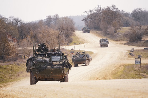 Vilseck, Germany. (September 10, 2022): In this photo by Sergeant LaShic Patterson, U.S. Army Stryker vehicle variants, assigned to the 2nd Cavalry Regiment, maneuver downhill during Dragoon Ready exercises at Hohenfels Training Area, Germany. The 2nd Cavalry has the distinction of being the longest active serving Cavalry Regiment in the Army. 