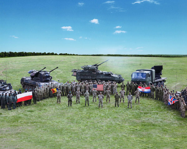 Pictured above are members of the 1st Squadron, 2nd U.S. Cavalry Regiment standing in formation with our NATO allies while deployed to Poland to counter potential aggression from Russia.  The 2nd Cavalry awarded a Certificate of Achievement to Support Our Troops, a U.S. based charity dedicated to improving the lives of active duty deployed servicemembers around the world.