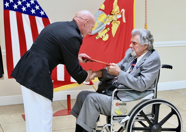 Sarasota, FL. (September 17, 2021): In this photo by Gunnery Sergeant Eric Alabiso, U.S. Marine Corps Chief of Staff Colonel John Polidoro pins the Silver Star upon Corporal Salvatore Naimo, seventy years after his heroic actions in the Korean War. Due to a series of tragic mishaps, Corporal Naimo was never formally recognized for risking his life to save fellow Marines (details below).