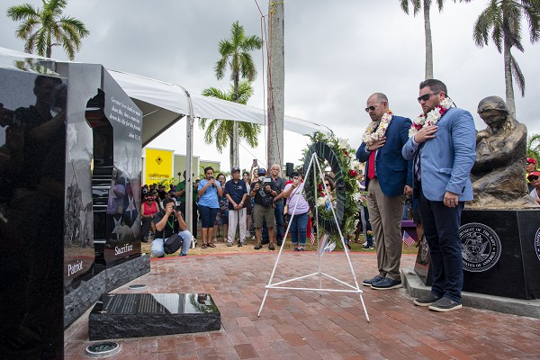 HAGATNA, Guam (July 25, 2022): In this photo by Shaina Marie O’Neal, family members of the late Hershel "Woody" Williams lay a wreath at the new Gold Star Families Memorial Monument during an unveiling ceremony. Williams was the last remaining Medal of Honor recipient from World War II and founder of the Woody Williams Foundation, which honors Gold Star families and servicemembers who lost their lives in the line of duty. 