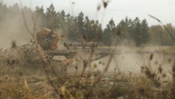 Hokkaido, Japan. (October 3, 2022): In this photo by Sergeant Kallahan Morris, Marine Corps Sgt. Ryan Lauritsen, a scout sniper with the 3rd Battalion, 3rd Marines, fires a M107 Special Application Scoped Rifle during Exercise Resolute Dragon 22. The maneuvers are central to the U.S./Japan Alliance which stands ready to counter aggression in the South China Sea. In addition to marksmanship, Marine Scout Snipers train in land navigation, surveillance, and mission planning at Quantico, Virginia.