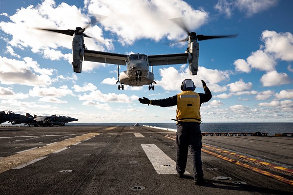 Baltic Sea. (October 12, 2022): In this photo by Corporal Yvonna Guyette, a U.S. Marine Corps MV-22 Osprey assigned to the 22nd Marine Expeditionary Unit (MEU) approaches the flight deck during flight operations aboard the Wasp-Class amphibious assault ship USS Kearsarge. The 22nd MEU is on a scheduled deployment to U.S. Naval Forces Europe to support the Sixth Fleet defending American and allied partners in the Baltic Sea.