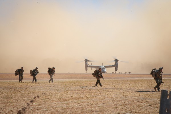 South Goulburn Island, Australia. (October 10, 2022): In this photo by Corporal Emeline Mola, U.S. Marines with India Company, 3rd Battalion, 7th Marines arrive in Australia ferried by Tiltrotor Squadron 268 Reinforced MV-22 Osprey aircraft. The Marines are participating in Expeditionary Base Operations exercises as part of Marine Rotational Force Darwin 22, a 25-year defense pact with one of America’s oldest friends.