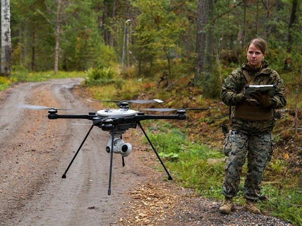 Berga Naval Base, Sweden. (October 28, 202): In this photo by 1st Lieutenant William Reckley, U.S. Marine Corps Sergeant Danielle Grimshaw, an intelligence analyst with the Littoral Engineer Reconnaissance Team, 8th Engineer Support Battalion, deploys a R80D Skyraider unmanned aerial system during Exercise Archipelago Endeavor 22.