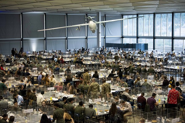 U.S. Air Force Academy, Colorado Springs, CO. (October 2, 2022): In this photo by Joshua Armstrong, Cadets fill the U.S. Air Force Academy’s Mitchell Hall for Thanksgiving Dinner, many for the first time in their lives away from home. The Mitchell Hall staff prepared about 4,000 meals a festive atmosphere for the young cadets who stayed at the Academy during the Thanksgiving Holiday. 