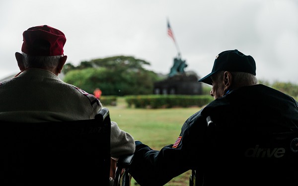 Marine Corps Base Hawaii. (November 10, 2022): U.S. World War II veterans sit together at the Iwo Jima Memorial, Hawaii, as Marines with the 3rd Battalion, 3rd Marines gather to express their gratitude to the more than 63 Iwo Jima veterans on the 80th anniversary of the attack on Pearl Harbor. 