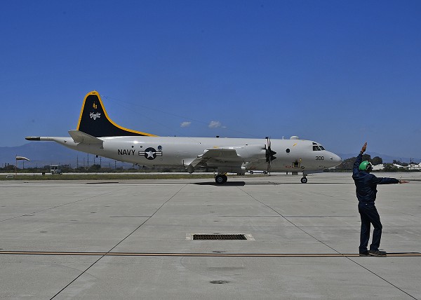 POINT MUGU, Calif. (May 11, 2022). In this photo by Ensign Drew Verbis, a P-3 Orion maritime patrol aircraft assigned to Air Test and Evaluation Squadron 30 completes its landing during the final flight of Cmdr. Jason Saglimbene, commanding officer onboard Naval Base Ventura County. Cmdr. Saglimbene, a native of Wyckoff, New Jersey, graduated from the United States Naval Academy in May 2002 and earned his Naval Aviator wings in August 2003.