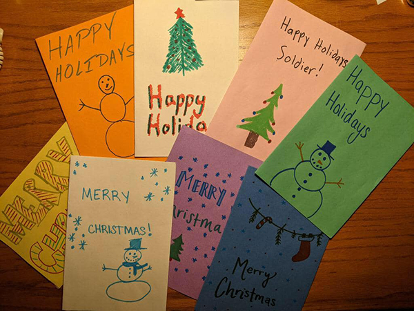 U.S., December 13, 2022—A few of the beautiful Christmas cards to the troops from kids and adults all across this great big beautiful nation of ours. All of the care packages being shipped out include several of these cards to keep and share and post. One of their best Christmases ever!