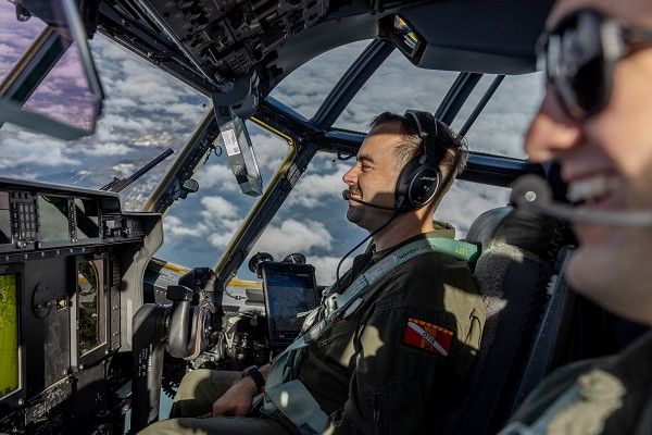 Naval Air Station Oceana, VA. (December 5, 2022): In this photo by Corporal Caleb Stelter, U.S. Marine Corps Major Richard Webb, a pilot with Marine Aerial Refueler Transport Squadron flies a KC130J Hercules near Naval Air Station Oceana, Virginia.