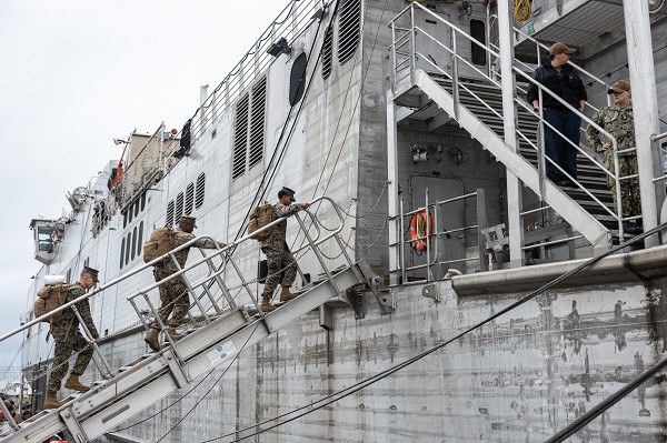 Ljubljana, Slovenia. (December 8, 2022): In this photo by Sergeant Scott Jenkins, U.S. Marines assigned to 2nd Expeditionary Force board the Spearhead-class expeditionary fast transport USNS Trenton. Based out of Camp Lejeune, North Carolina, these Marines will embark on the Trenton as they practice rapidly deploying from aboard Navy ships.
